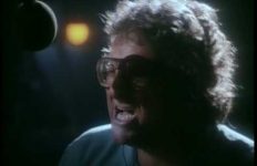 Randy Newman singing with TV cops