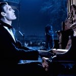 Playing his mighty organ