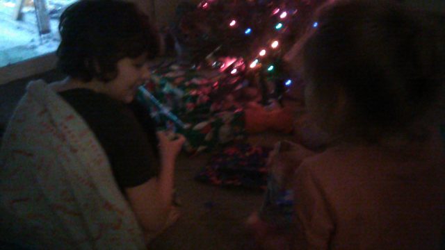 My kids unwrapping their Yule presents