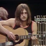 With the eponymous bells behind him