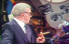 Gonzo fiddles while George Burns