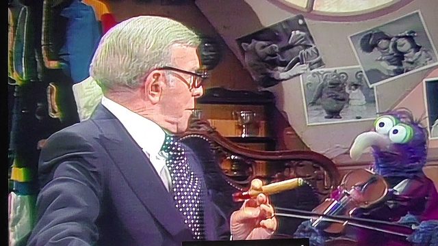 Gonzo fiddles while George Burns