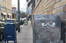 Film... mailbox... phone booth... just need to add somebody writing a check for their cable bill on the way to the office to complete the BINGO.
